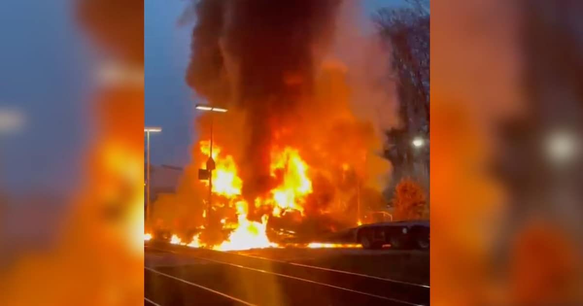 Passenger train crashes into car transporter: video shows explosion